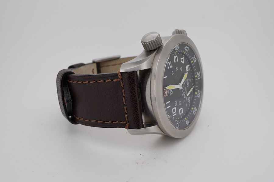 A gentleman's recent stainless steel Victorinox Swiss Army stainless steel manual wind wrist watch with black Arabic dial and subsidiary seconds, case diameter 45mm, on a brown leather strap, no box or papers.